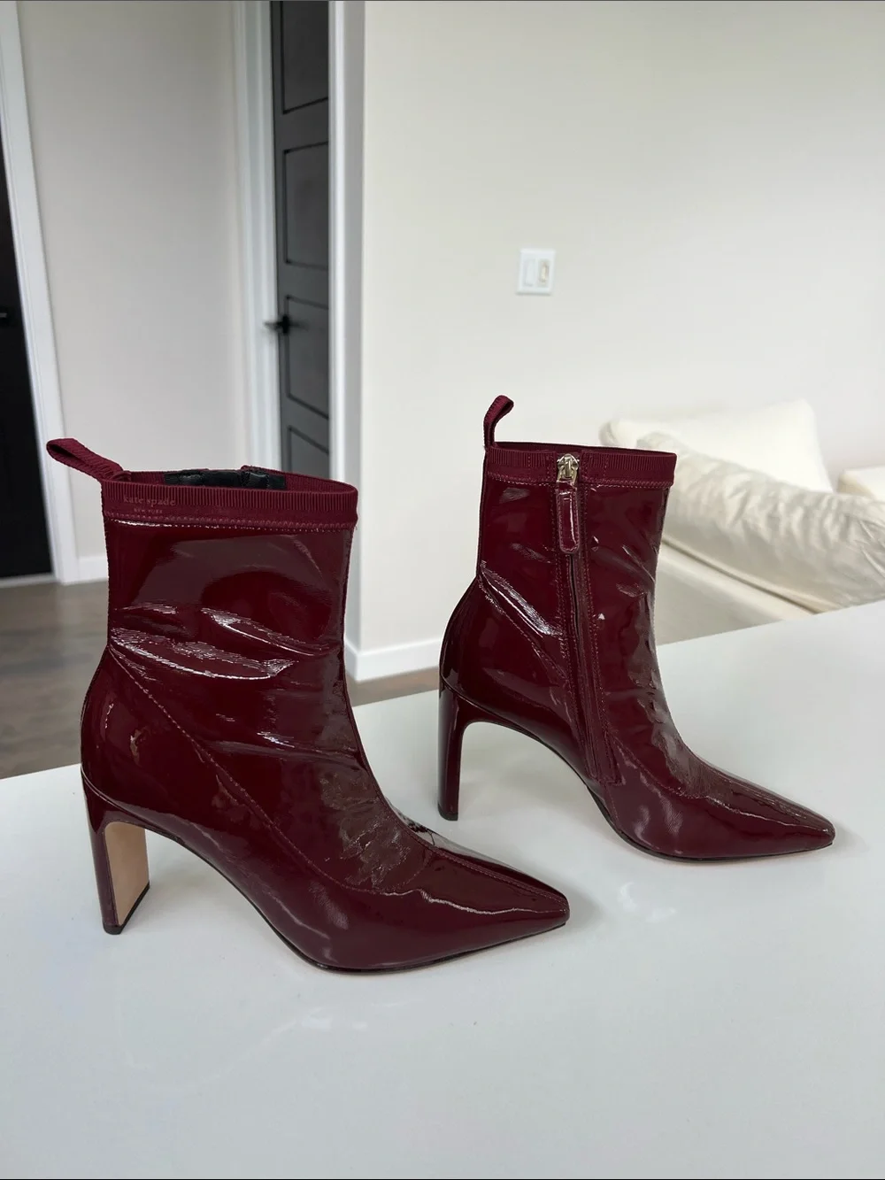 Kate Spade down under stretch patent cordovan dark red pointed toe booties ankle